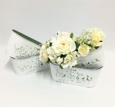 Oval flower buckets $6.60 each (Not including flowers) 