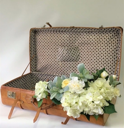 Vintage suitcase $25.00 Excluding flowers